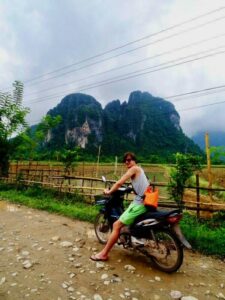 wit morris on motorcycle in laos