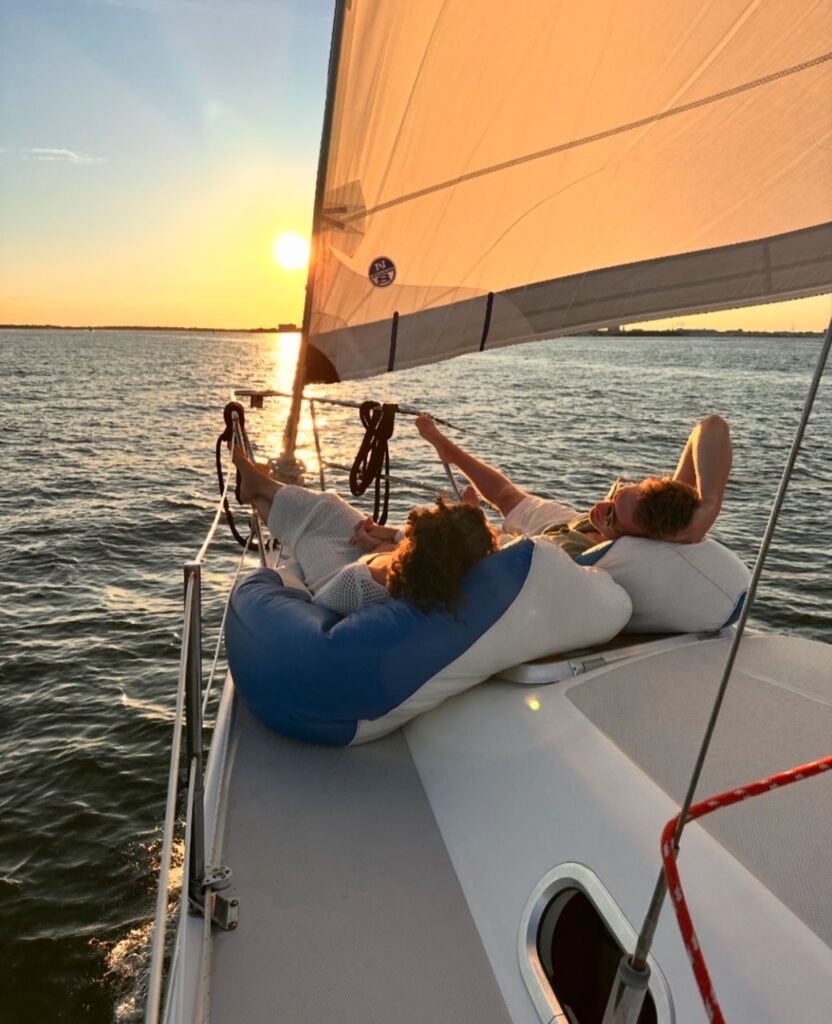 sunset view from private sailbot tour in charleston sc